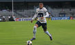 Rogelio Funes Mori #29 of Pumas de la UNAM dribbles the ball during the match between Puma...