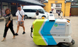 An intelligent sweeping robot works at Xuanmiaiguan Square on Guanqian Street in Suzhou, C...