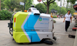An intelligent sweeping robot works at Xuanmiaiguan Square on Guanqian Street in Suzhou, C...