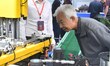 Buyers visit production equipment at the 17th China Handan (Yongnian) Fastener and Equipme...