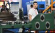 Buyers shop for production equipment at the 17th China Handan (Yongnian) Fasteners and Equ...