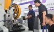 Buyers shop for production equipment at the 17th China Handan (Yongnian) Fasteners and Equ...
