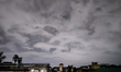 Dark rain clouds appear on the skyline in Siliguri, India, on September 27, 2024. Four peo...