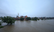 The swollen Bagmati River inundates areas across Kathmandu, Nepal, following incessant rai...