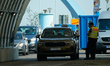 Police are seen performing checks at the Polish-Germany border in Frankfurt (Oder), German...