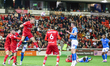Marc Roberts of Barnsley gets up to head the ball clear during the Sky Bet League 1 match...
