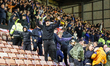 The Stockport fans are energized by the injury time equalizer by #20, Louie Barry, during...