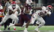 Texas A&M Aggies running back Amari Daniels #5 rushes with the ball against the Arkansas R...