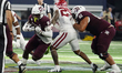 Texas A&M Aggies running back Le'Veon Moss #8 runs with the ball against the Arkansas Razo...