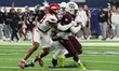 Texas A&M Aggies running back Le'Veon Moss #8 runs with the ball against the Arkansas Razo...