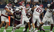 Arkansas Razorbacks quarterback Taylen Green #10 passes the ball against Texas A&M Aggies...