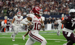 Arkansas Razorbacks quarterback Taylen Green #10 rushes with the ball against Texas A&M Ag...