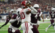 Arkansas Razorbacks quarterback Taylen Green #10 passes the ball against Texas A&M Aggies...