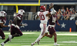Arkansas Razorbacks quarterback Taylen Green #10 passes the ball against Texas A&M Aggies...