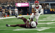 Arkansas Razorbacks Wide Receiver Isaiah Sategna #6 catches the ball against Texas A&M Raz...