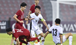 Tan-Vaissiere Louka of Singapore battles for the ball with Chan Kwan Ching Osmond of Hong...