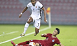Lim Zheng Wu (bottom) of Singapore battles for the ball with Anthony Francis Pinto (left)...