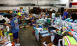People collect donations at the Lansing Volunteer Fire Department in Lansing, North Caroli...