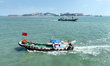 Police aboard a ''Hongfan 110'' boat conduct a maritime patrol operation in Zhoushan, Chin...