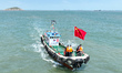 Police aboard a ''Hongfan 110'' boat conduct a maritime patrol operation in Zhoushan, Chin...