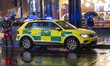 Paramedic, Medical worker and an Ambulance in London. Emergency Services Ambulance Vehicle...