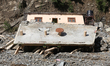 A house is damaged by flooding in Kavrepalanchowk District, Nepal, on October 1, 2024. 
