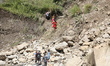 Nepali passengers travel through the BP Highway, a major highway that connects Kathmandu d...