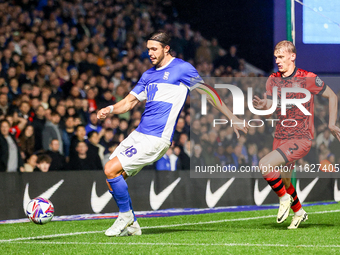 #18, Willum Por Willumsson of Birmingham is chased by #2, Lasse Sorensen of Huddersfield during the Sky Bet League 1 match between Birmingha... by MI News/NurPhoto