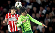 PSV Eindhoven defender Olivier Boscagli and Sporting Club Portugal forward Francisco Trinc...