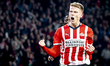 PSV Eindhoven midfielder Jerdy Schouten scores the 1-0 and celebrates the goal during the...