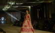 Bollywood actress Tripti Dimri presents a creation by Indian designer Manish Malhotra to s...