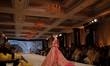 A model presents a creation by Indian designer Manish Malhotra to showcase the Handloom In...