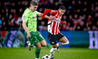 Sporting Club Portugal forward Viktor Gyokeres and PSV Eindhoven defender Mauro Junior dur...