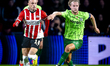 PSV Eindhoven forward Noa Lang and Sporting Club Portugal midfielder Morten Hjulmand durin...