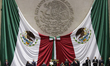 Claudia Sheinbaum (off-white dress) arrives at the Chamber of Deputies in Mexico City, Mex...