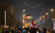 An Iranian man (not pictured) waves a Palestinian flag while celebrating Iran's missile at...