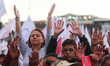 Followers of Mexico's new president, Claudia Sheinbaum Pardo, attend the Zocalo main squar...