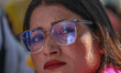A female worker of the Jammu and Kashmir Pradesh Congress Committee (JKPCC) participates t...