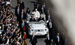 Pope Francis greets the crowd at the end of a mass for the opening of the Ordinary General...