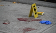 The NYPD Crime Scene Unit canvasses the area outside a senior center where 40-year-old Kav...
