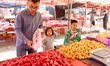 Citizens shop at a market in Qingdao, China, on October 3, 2024. 