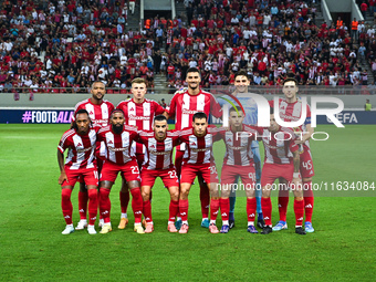 Players of Olympiacos FC stand before the Europa League Matchday 2 match between Olympiacos FC and SC Braga at Georgios Karaiskakis Stadium... by Stefanos Kyriazis/NurPhoto