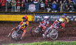 Sam Masters of Leicester Lions in red leads Jaimon Lidsey of Belle Vue Aces in white, Antt...