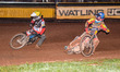 Sam Hagon of Leicester Lions in blue competes against Antti Vuolas of Belle Vue Aces in ye...
