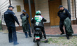 A Femen activist sits on a moped outside the Embassy of Iran to participate in a protest a...