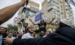 Orthodox Jewish pilgrims dance outside the tomb of Rabbi Nachman while celebrating Rosh Ha...