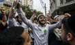 Orthodox Jewish pilgrims dance outside the tomb of Rabbi Nachman while celebrating Rosh Ha...