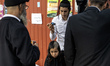 Ultra-Orthodox Jewish Hasidic pilgrims have haircuts on the eve of the Rosh Hashanah holid...