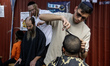 Ultra-Orthodox Jewish Hasidic pilgrims have haircuts on the eve of the Rosh Hashanah holid...