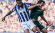 Darnell Furlong of WBA and George Honeyman of Millwall battle for possession during the Sk...
